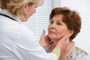 Oral Cancer Screening: A node that is hard and fixed to the tissue (non-mobile) is an indication to refer a patient to an otolaryngologist (ENT) or physician for an exam and possible biopsy.